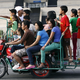 Illustration for article titled Incredible Ways People Deal with Overloaded Transit Systems in Asia